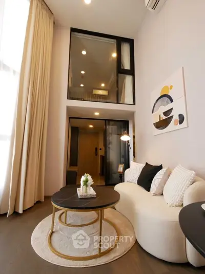 Modern living room with high ceiling and stylish decor