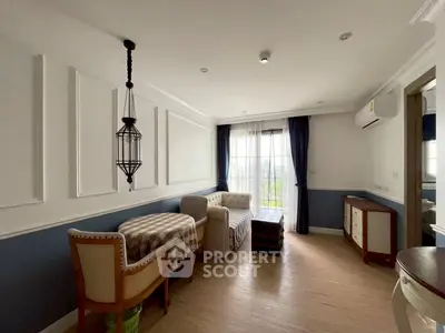 Charming living room with elegant decor and natural light, perfect for relaxation and entertaining.