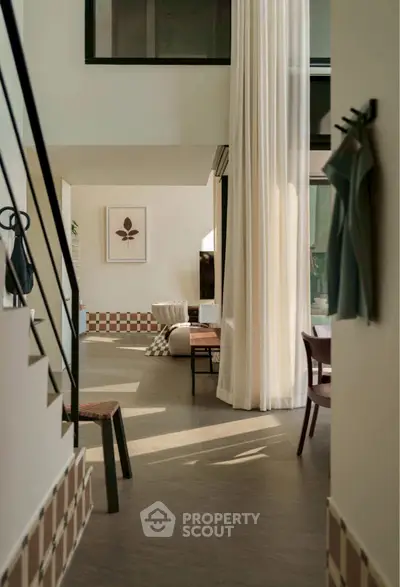 Spacious modern living room with high ceilings and elegant decor