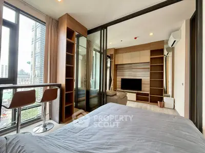 Modern studio apartment with city view and stylish interior design