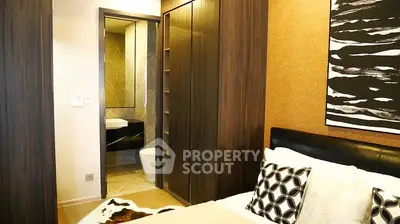 Modern bedroom with ensuite bathroom and stylish decor