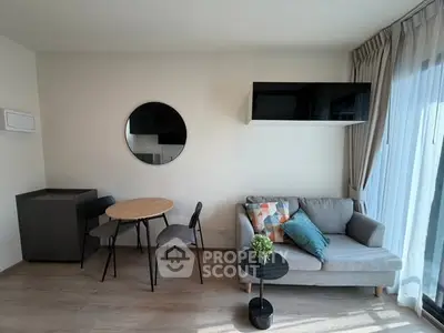 Modern living room with stylish furniture and natural light
