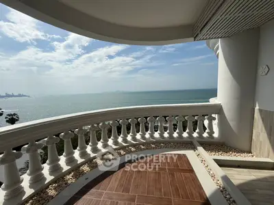 Stunning ocean view from elegant balcony with classic balustrade design