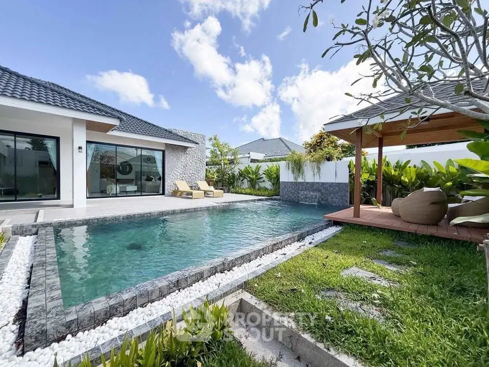Luxurious villa with private pool and lush garden, perfect for relaxation and leisure.