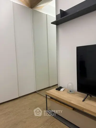 Modern living room with sleek TV stand and minimalist decor