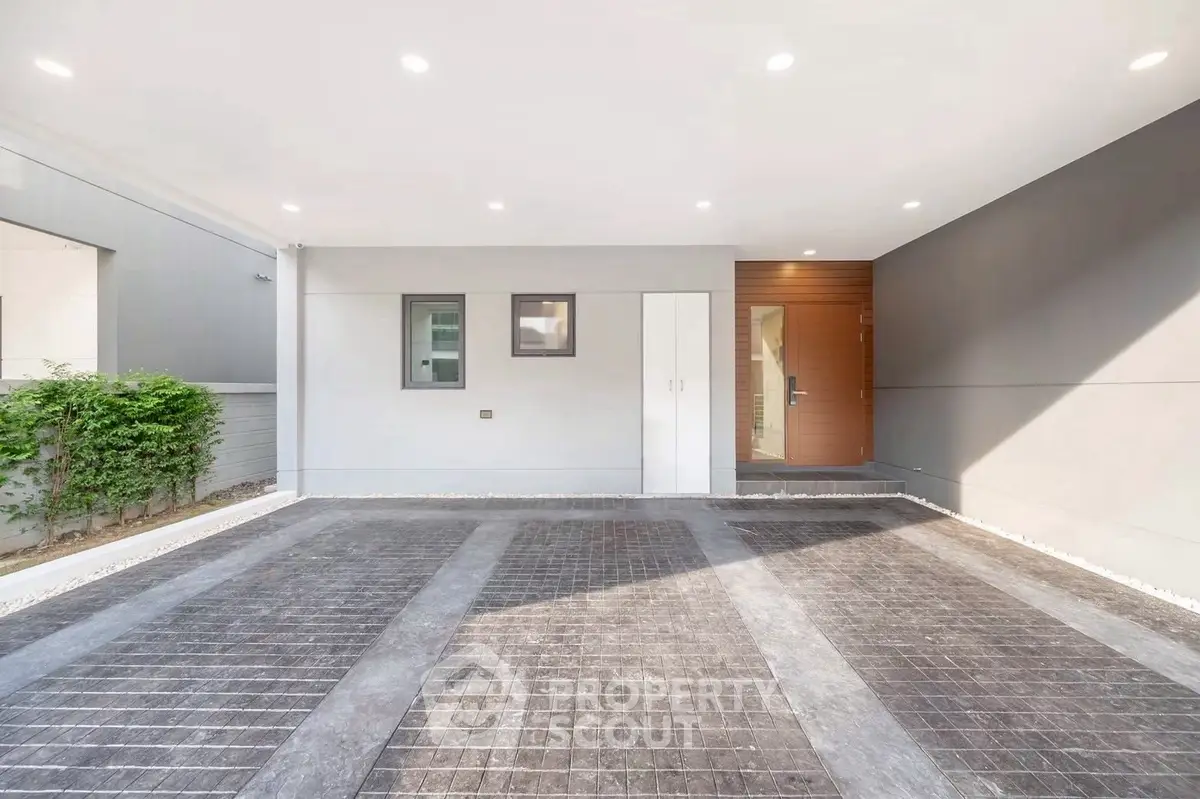 Spacious modern parking area with sleek design and ample lighting