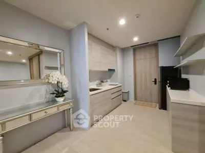 Modern kitchen with sleek cabinetry and elegant decor