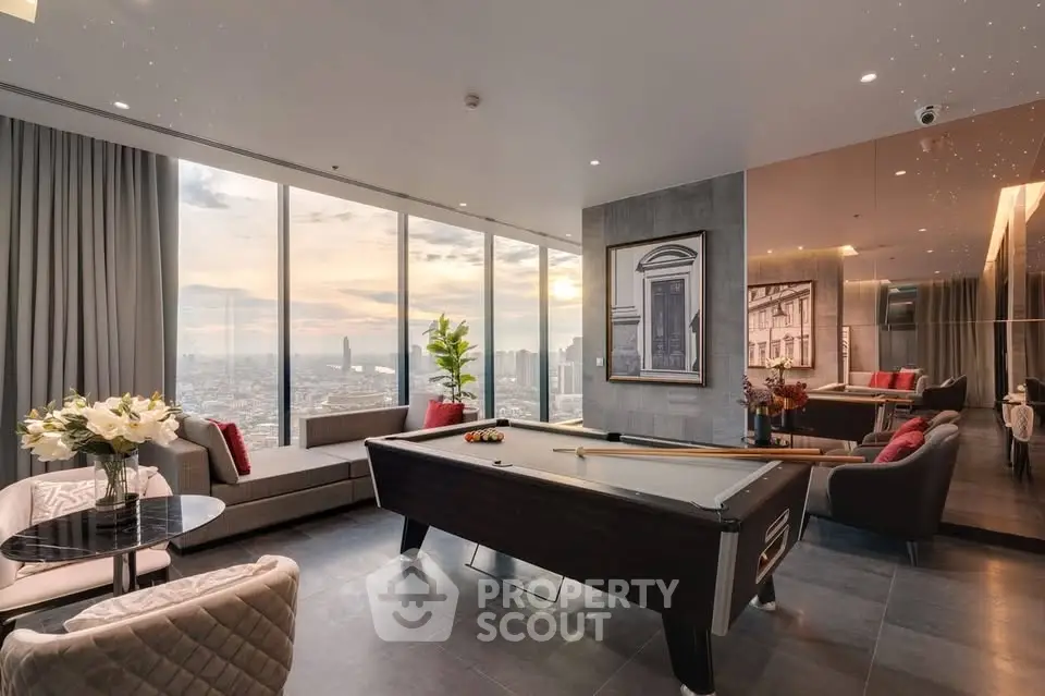 Luxurious living room with pool table and stunning city view