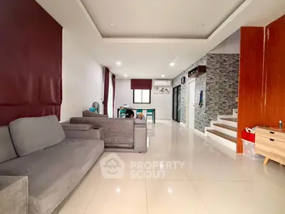 Spacious modern living room with sleek design and stylish furniture