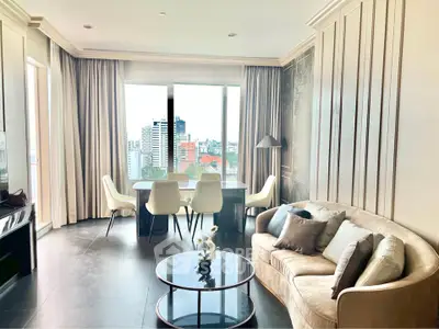 Luxurious living room with city view, elegant decor, and modern furniture