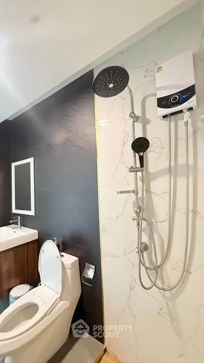 Modern bathroom with sleek shower and elegant fixtures, perfect for a contemporary home.