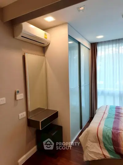 Modern bedroom with air conditioning and stylish decor in a cozy apartment