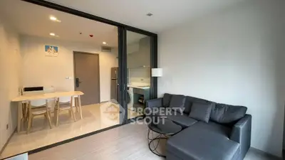 Modern living room with sleek furniture and open layout, perfect for contemporary living.