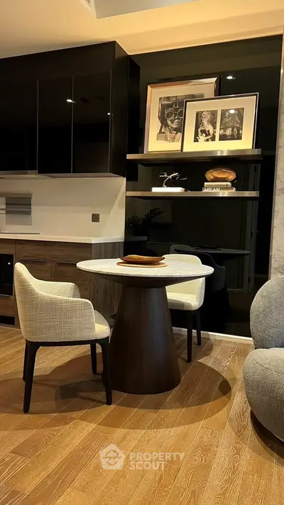 Stylish modern living room with elegant furniture and wooden flooring, perfect for cozy gatherings.