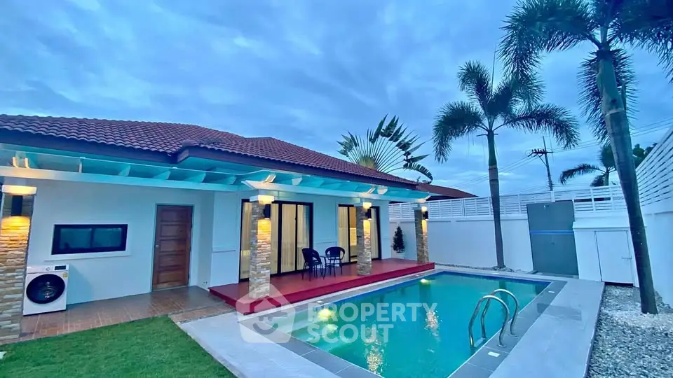 Stunning villa with private pool and lush garden, perfect for luxury living.