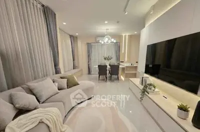 Luxurious modern living room with elegant decor and spacious seating area