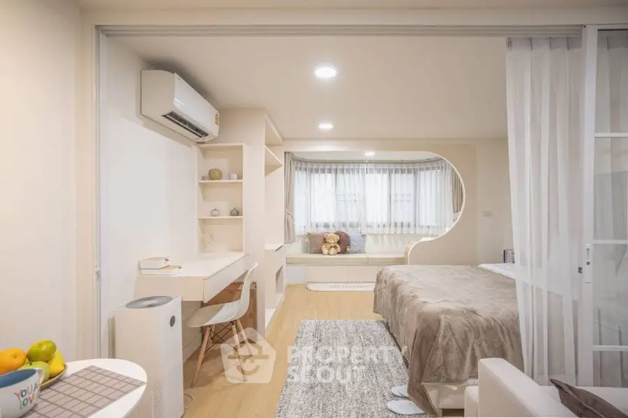 Modern cozy bedroom with study area and stylish decor