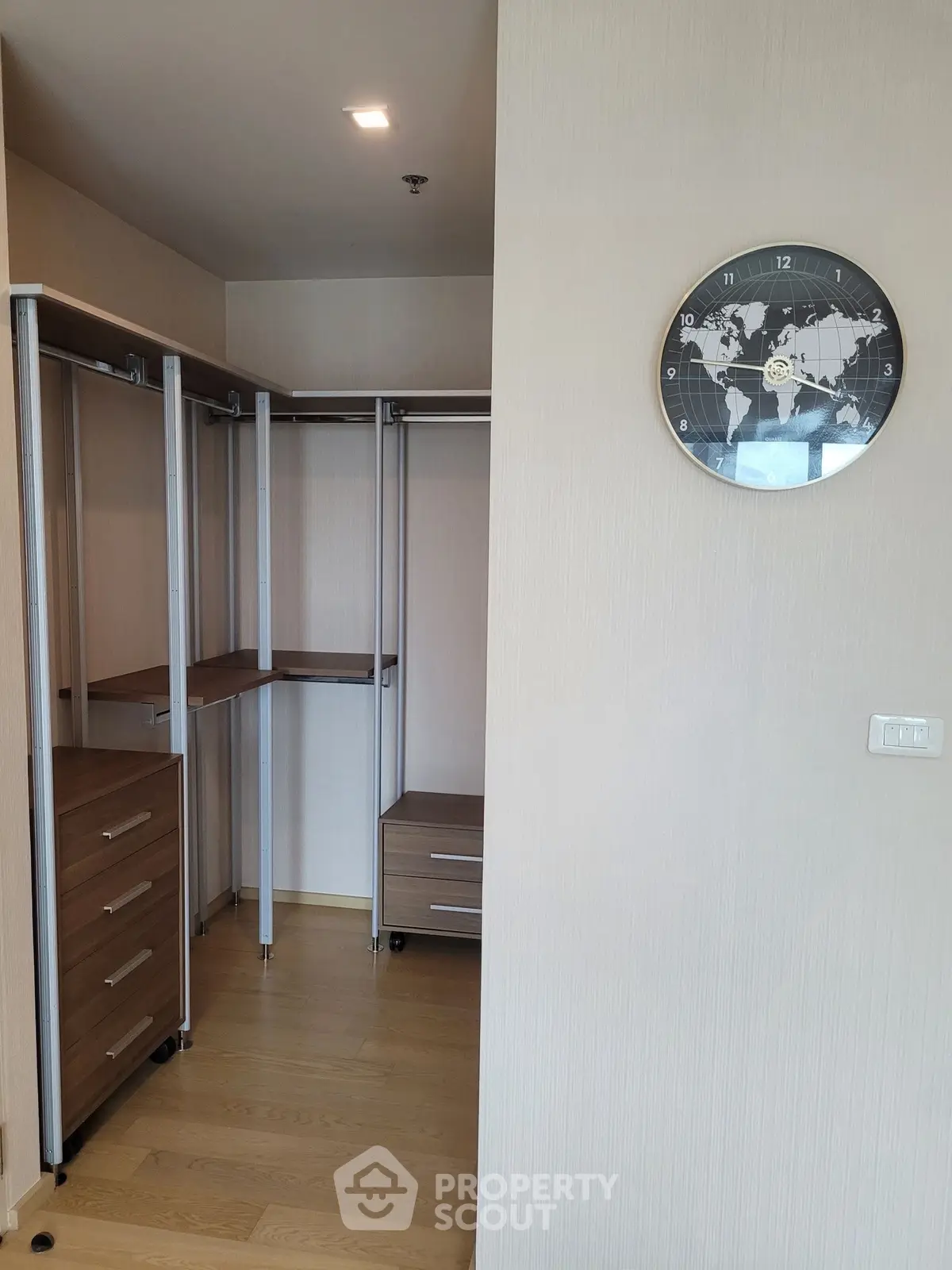 Spacious walk-in closet with modern design and ample storage space