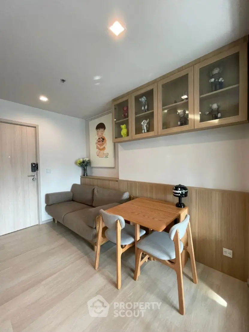 Modern living room with stylish furniture and decorative shelving