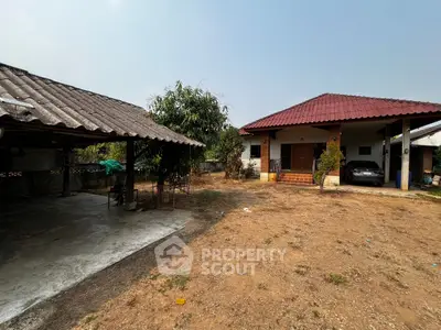 Charming rural property with spacious yard and covered parking, ideal for countryside living.