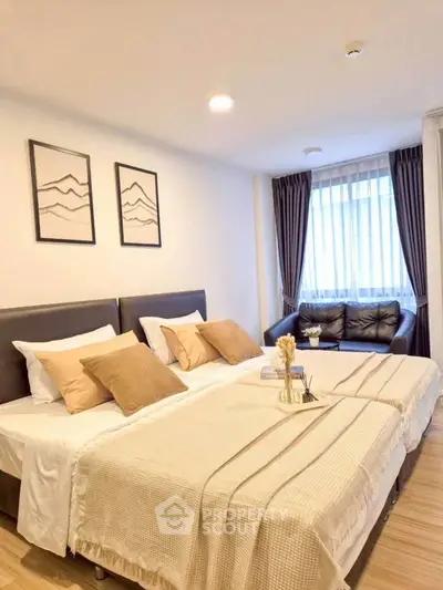 Elegant bedroom with cozy twin beds and stylish decor