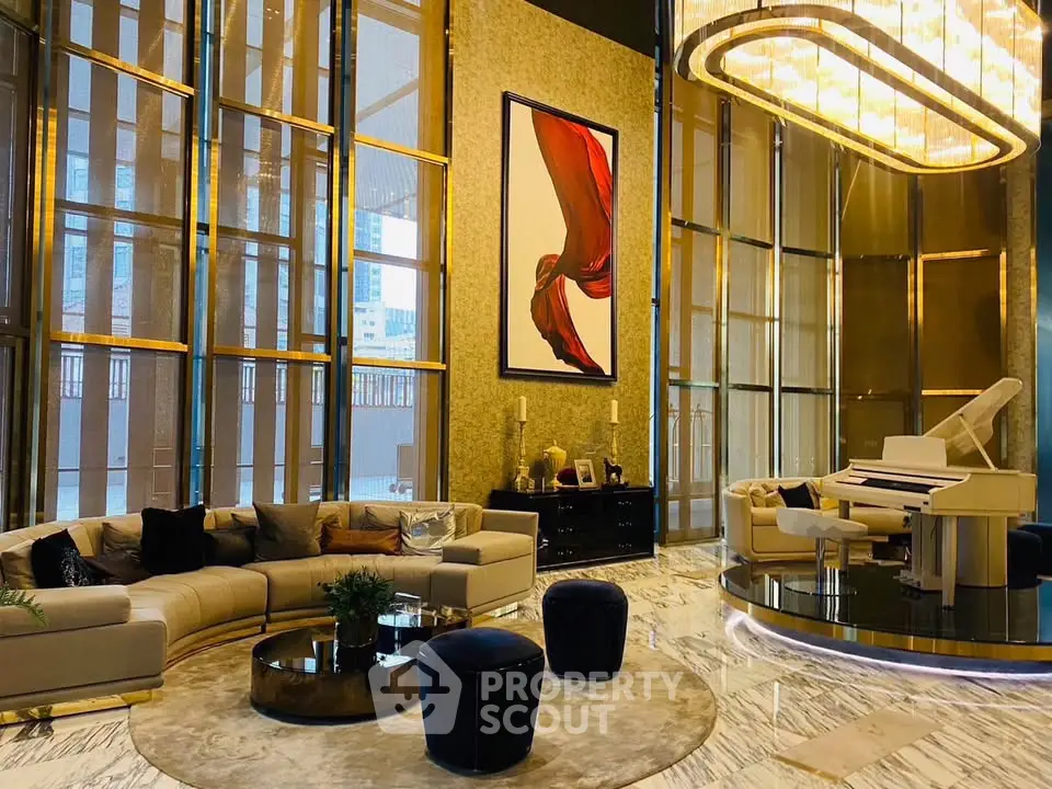 Luxurious high-ceiling living room with grand piano and elegant decor in a modern apartment.