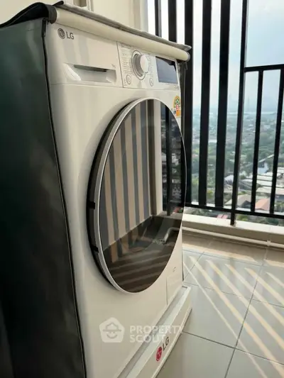Modern washing machine on balcony with city view, perfect for urban living convenience.