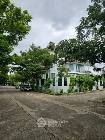 Charming corner house with lush greenery and spacious driveway