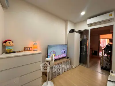 Cozy living room with modern decor and air conditioning