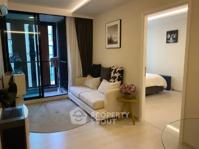 Modern living room with cozy sofa and balcony view in stylish apartment