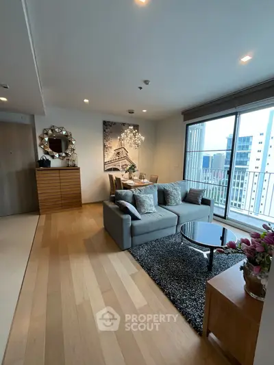 Stylish living room with modern decor and city view balcony
