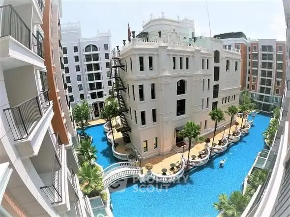 Luxurious residential complex with stunning pool and elegant architecture
