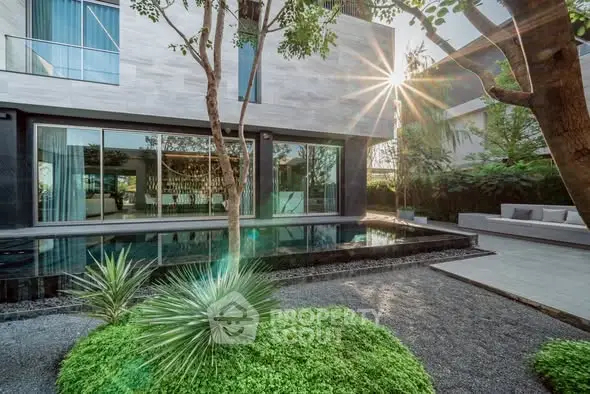 Luxurious modern home with private pool and lush garden