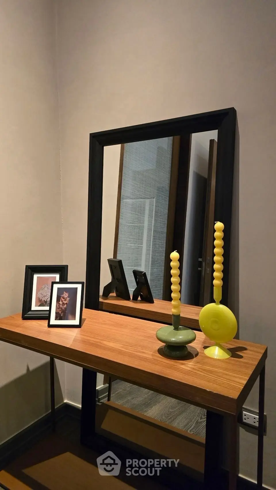 Stylish entryway with modern console table and decorative mirror
