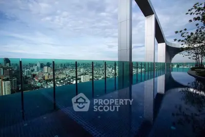 Stunning rooftop infinity pool with panoramic city skyline views