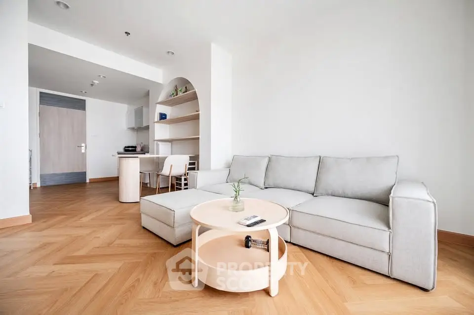 Modern living room with stylish furniture and open layout in a contemporary apartment.