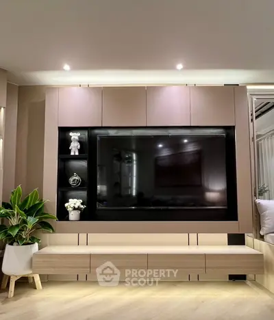 Modern living room with sleek TV unit and stylish decor