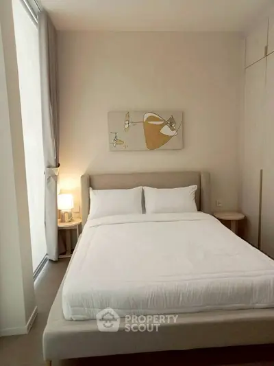 Modern bedroom with cozy bed and stylish decor in a bright apartment