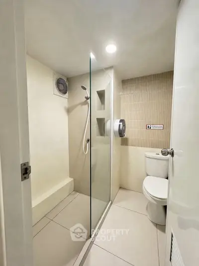 Modern bathroom with glass shower and sleek design