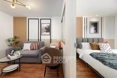 Modern studio apartment with stylish decor, featuring a cozy living area and comfortable bedroom.