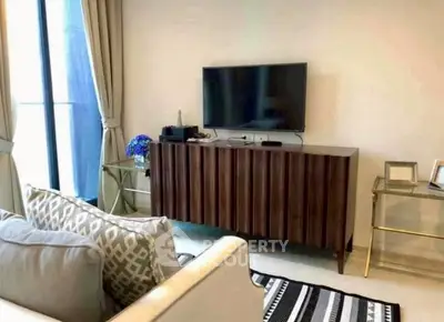 Stylish living room with modern TV setup and elegant decor