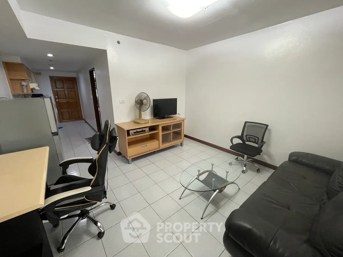 Modern living room with sleek furniture and open layout, perfect for comfortable living.