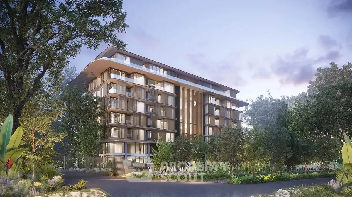 Modern architectural building surrounded by lush greenery at dusk