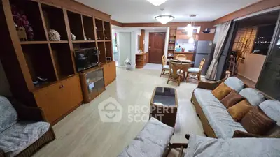 Spacious living room with elegant wooden furniture and open layout