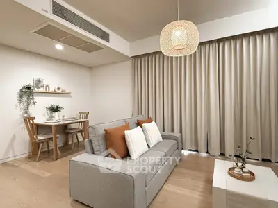 Cozy modern living room with stylish decor and natural lighting
