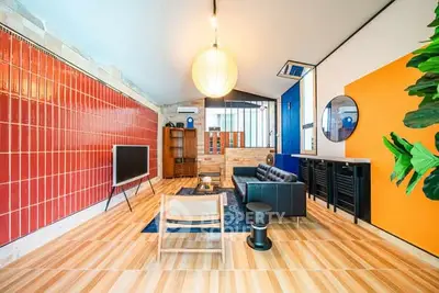 Stylish modern living room with vibrant colors and unique decor elements.