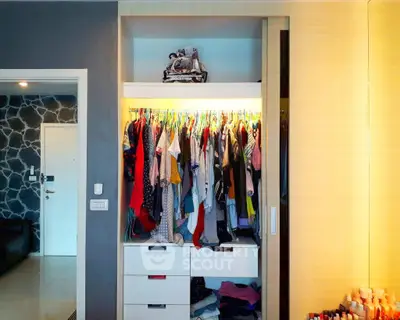 Spacious wardrobe in modern bedroom with ample storage and stylish design