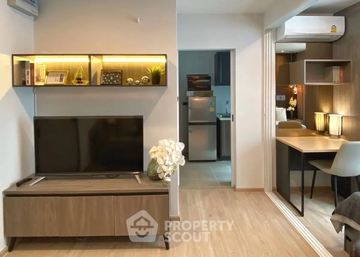 Modern living room with stylish decor and open kitchen layout