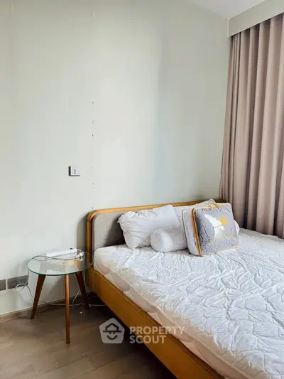 Cozy bedroom with modern bed and stylish side table