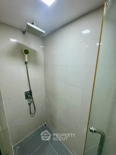 Modern bathroom with sleek shower design and glass door enclosure